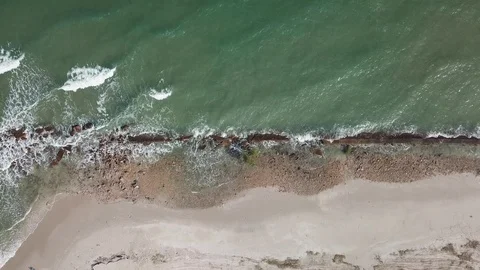 Vintage look of top view of waves break on tropical sand beach. Stock Footage 125289431
