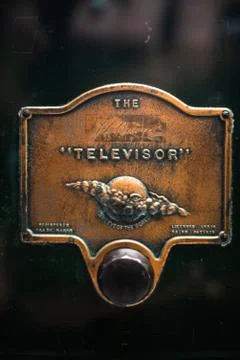 Vintage looking Detail of televisor aged plated device manchester uk industry Stock Photos