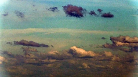 Vintage looking time-lapse of clouds on sunset sky Stock Footage 77617322