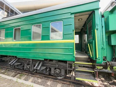 Vintage luxury train interior featuring rectangular car with vibrant green .. Stock Photos