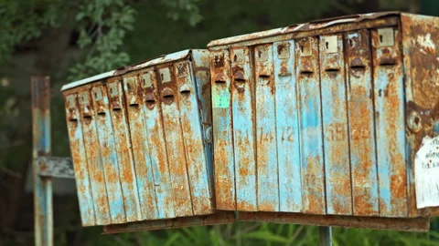 Vintage Mailboxes against long grass background in the village. Stock Footage 345161766