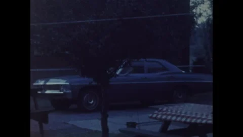Vintage man drinking at picnic table in 1961 Stock Footage 326896852