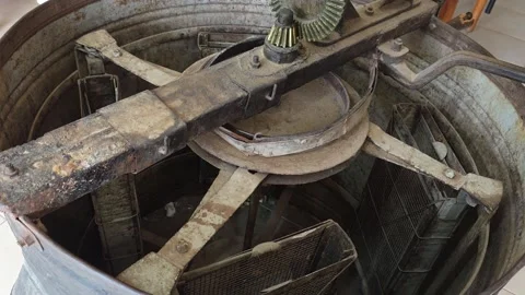 Vintage manual honey extractor machine inside a local honey shop, close-up o Stock Footage 338259893