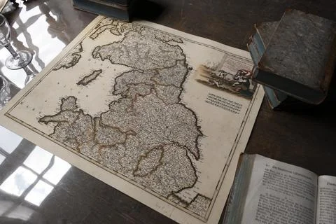 Vintage map on retro table Stock Photos