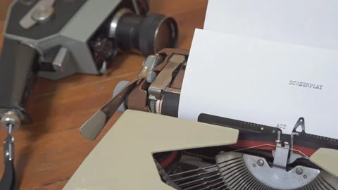 A vintage mechanical typewriter mid-action, featuring the word "ACT" typed .. Stock Footage 341438040