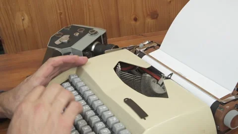 Vintage mechanical typewriter mid-action, featuring the word "ACT" typed on.. Stock Footage 341438151