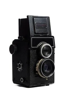 Vintage medium format camera with two lenses close-up on a white background Stock Photos