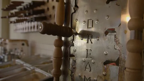 Vintage Metal Kitchen Tool With Engraved Words in Sydney Cafe Interior Close-Up Stock Footage 345659262