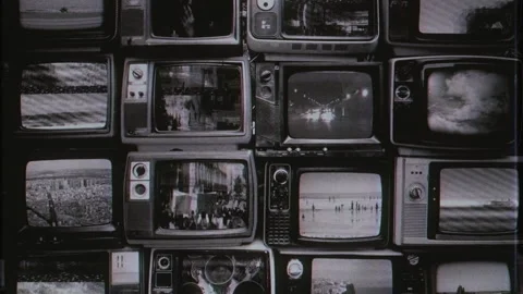 Vintage Monochrome Television Wall, Multiple Static Screens Tilt Up Stock Footage 336736196
