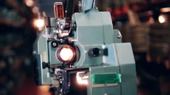 Old film projector is demonstrating a ta, Stock Video