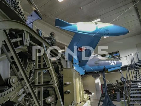 Vintage museum war combat airplane painted in blue color. Stock Photos