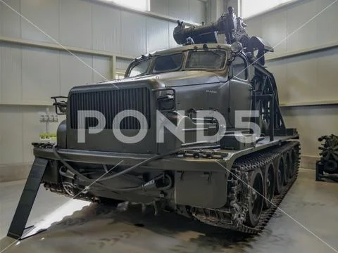 Vintage museum war combat vehicle painted in camouflage colors. Stock Photos