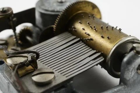 Vintage music box mechanism, metal prongs and cylinders Stock Photos