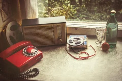Vintage objects on windowsill. Retro interior Stock Photos