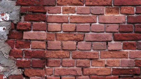 Vintage old brick wall as texture background in slow motion Stock Footage 150313804