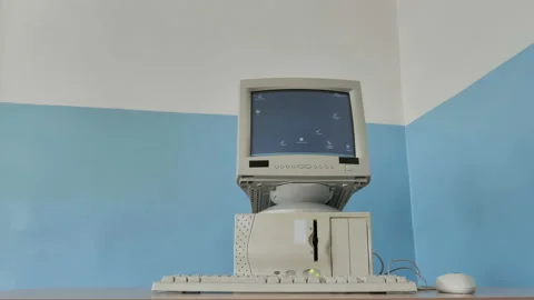 A Vintage Old Pc. Computer Screen, Keyboard, Computer Mouse 90S Style Stock Footage 126587897