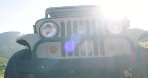 Vintage old truck adventure car in nature forest with sunset light Stock Footage 168917455
