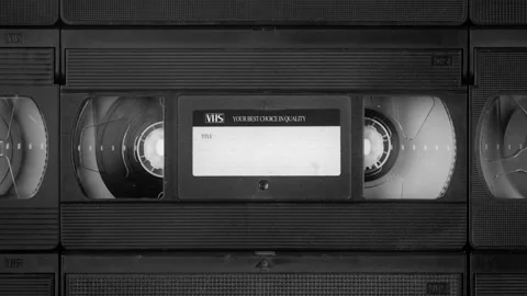 Vintage opening background of stop motion VHS cassette animation, plus VHS look Stock Footage 155945742
