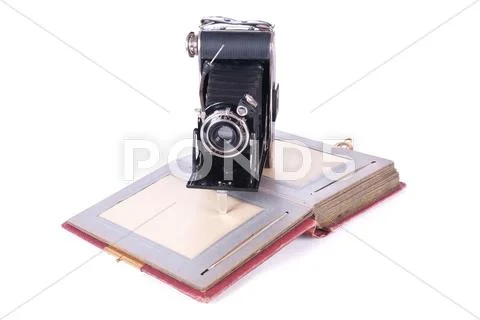 Vintage photography camera with old photoalbum Stock Photos