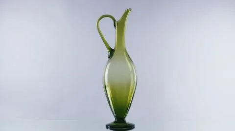 Vintage pitcher on white background Stock Footage 44404710