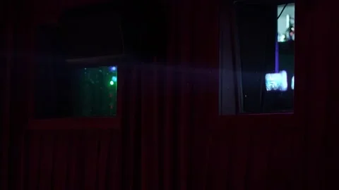 Vintage Projector Creates Atmospheric Viewing, Oldfashioned Projector Casts Glow 스톡 동영상 323773684