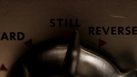 Vintage projector switch turning between reverse and forward settings Stock Footage 329752355