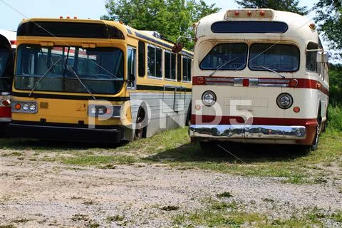Vintage public transportation vehicles - buses. Stock Photos