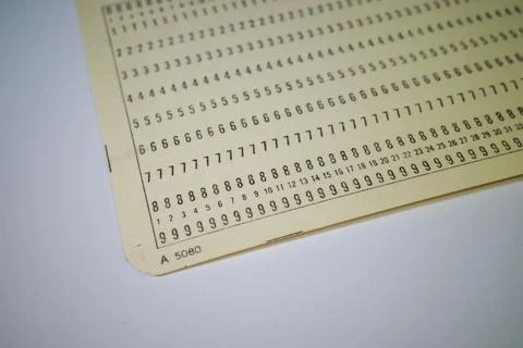 Vintage Punched Card with Numeric Data Stock Photos