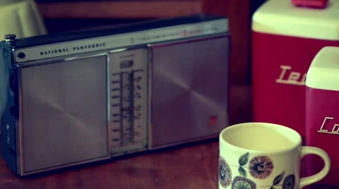 Vintage radio on kitchen bench Stock Footage