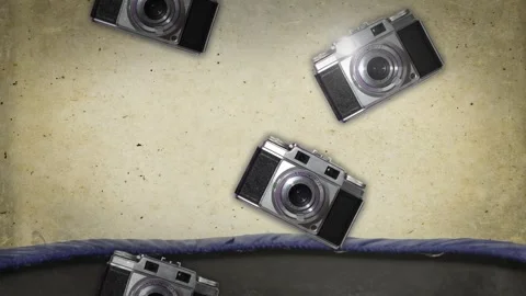 Vintage Rangefinder Cameras Falling and Tumbling Past Stock Footage 346783386