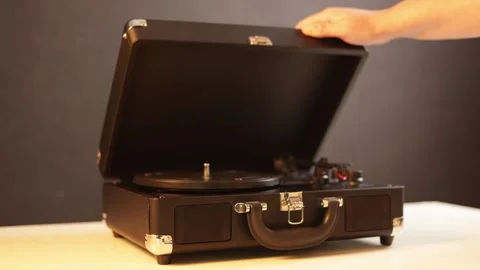 Vintage record player being opened to play music, retro audio device Stock Footage 339004153
