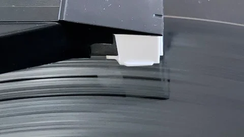 Vintage record player close up playing a 33 record background Stock Footage 244865433