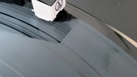 Vintage record player close up playing a 33 record background Stock Footage 244865531