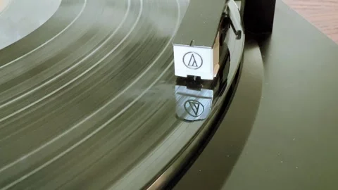 Vintage record player close up playing a 33 record background Stock Footage 244865584