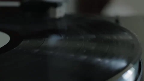 Vintage record spinning on record player 動画素材 169063198