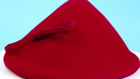 Vintage red bonnet with bow Stock Footage 314329307