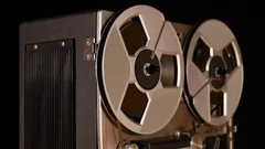 Vintage Reel to Reel tape recorder playing music, Stock Footage