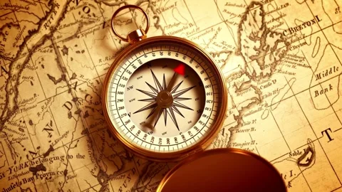 Vintage retro compass on ancient map background. navigation and exploration.. Stock Footage 257871248