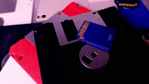 Vintage retro electronic data storage devices from the 80s, 90s, cd disk, fla Stock Footage 171388679