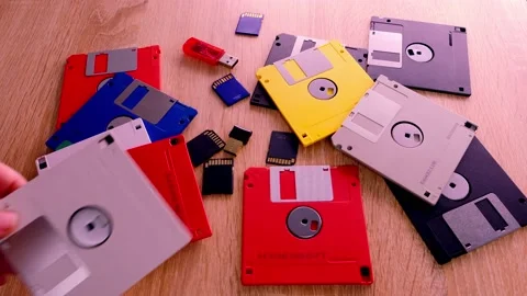 Vintage retro electronic data storage devices from the 80s, 90s, cd disk, fla Stock Footage 171388752