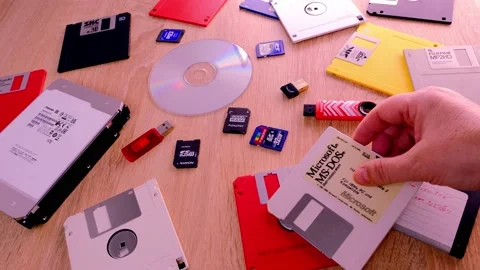 Vintage retro electronic data storage devices from the 80s, 90s, cd disk, fla Stock Footage 171947838