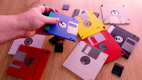 Vintage retro electronic data storage devices from the 80s, 90s, cd disk, f.. Stock Footage 244677244