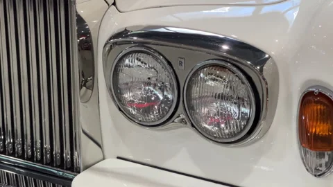 Vintage Rolls Royce Headlights Close Up Front Grille Detail | Luxury Car Stock Footage 345693552
