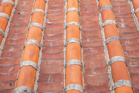 Vintage rooftop tile pattern, traditional ancient colorful tiles wallpaper. Stock Photos