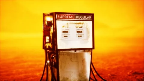 A vintage rusted gas pump abandoned in the desert Stock Footage