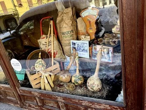 Vintage Rustic Store Window Display in Italy. Stock Photos