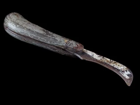 Vintage rusty folding pruning knife isolated on black background Stock Photos