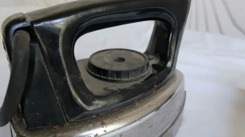 Vintage Rusty Iron On A Table. Slider equipment used Stock Footage 104298316