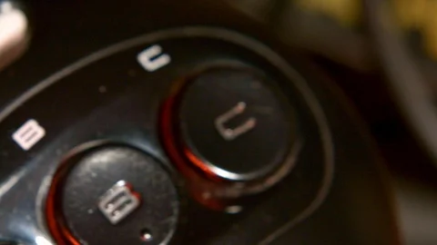 Vintage Sega Genesis Controller in Red Light SLIDE LEFT Stock Footage 102926305