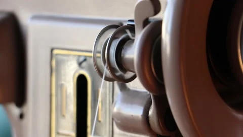 Vintage Sewing Machine Bobbin Wind 03 Stock Footage 153486728